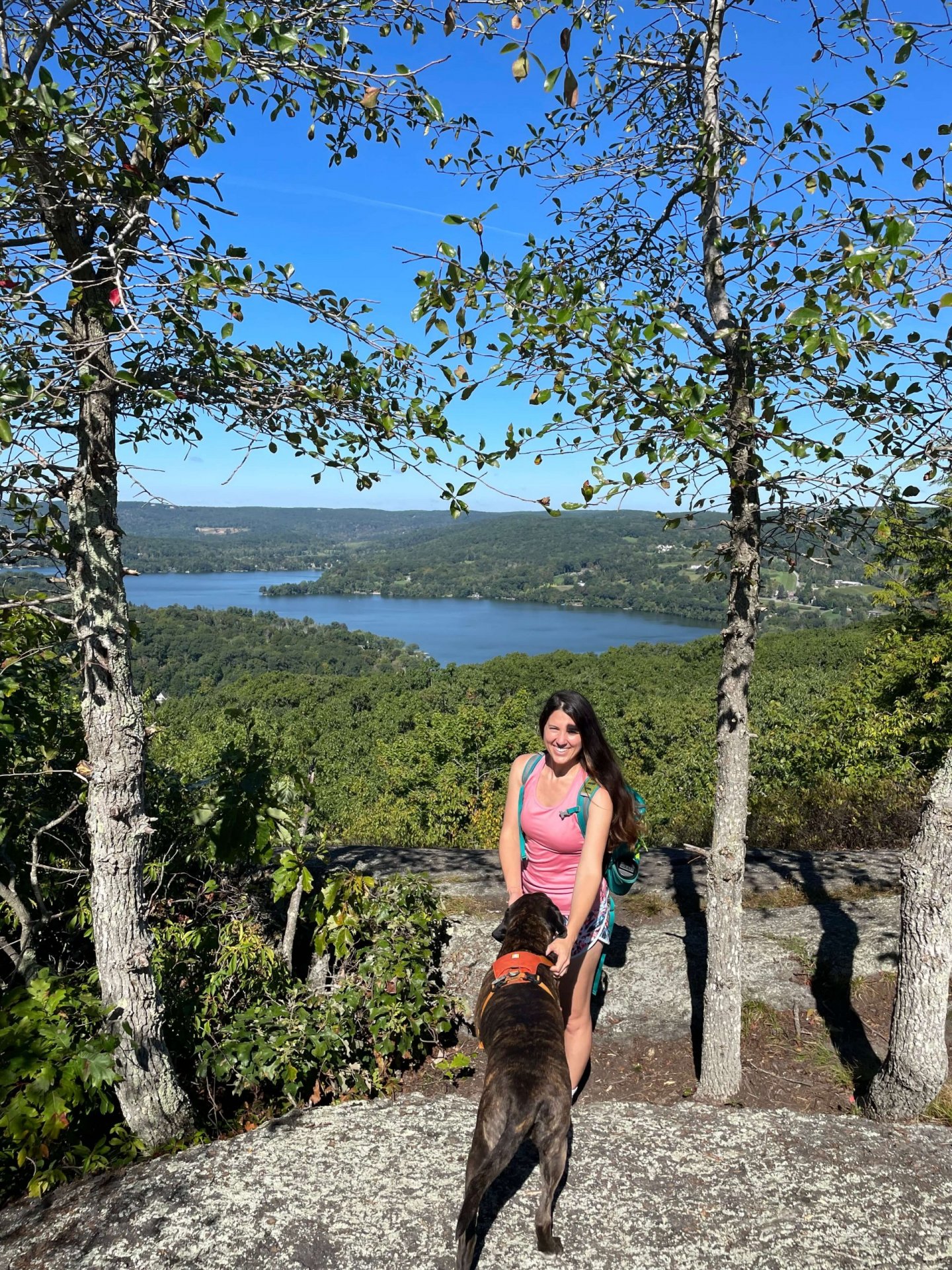 Girl and dog on Meeker trail hike in Connecticut