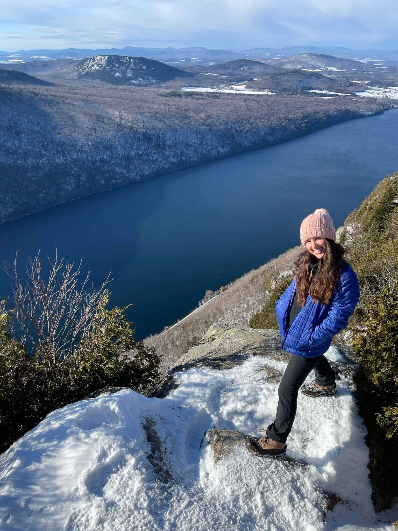 Women's winter hiking clothes including warm leggings and insulated boots