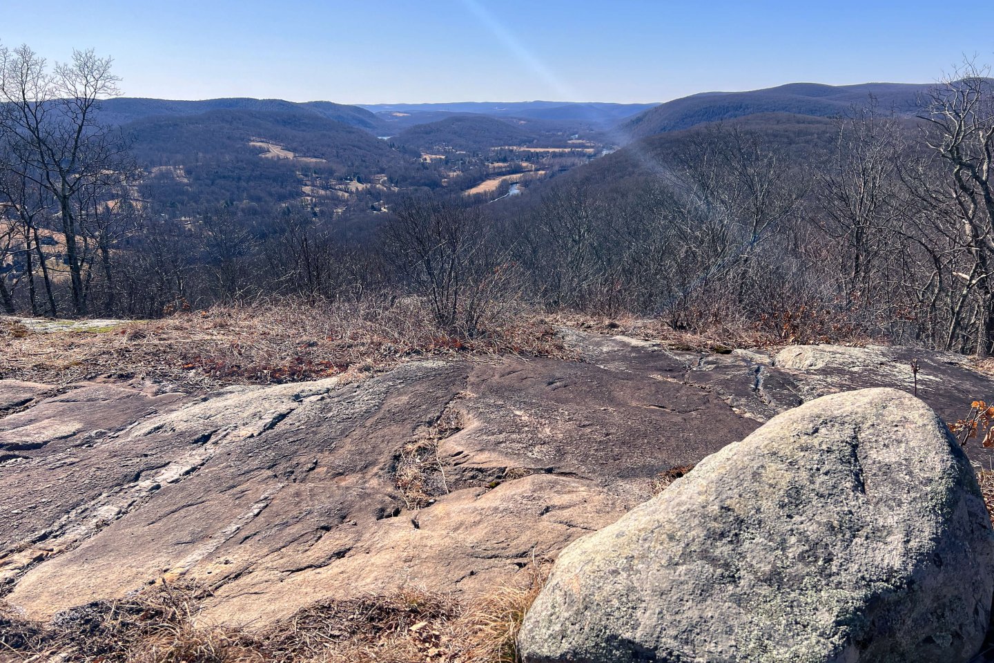 view on mountain top in connecticut with brown mountains in the distance