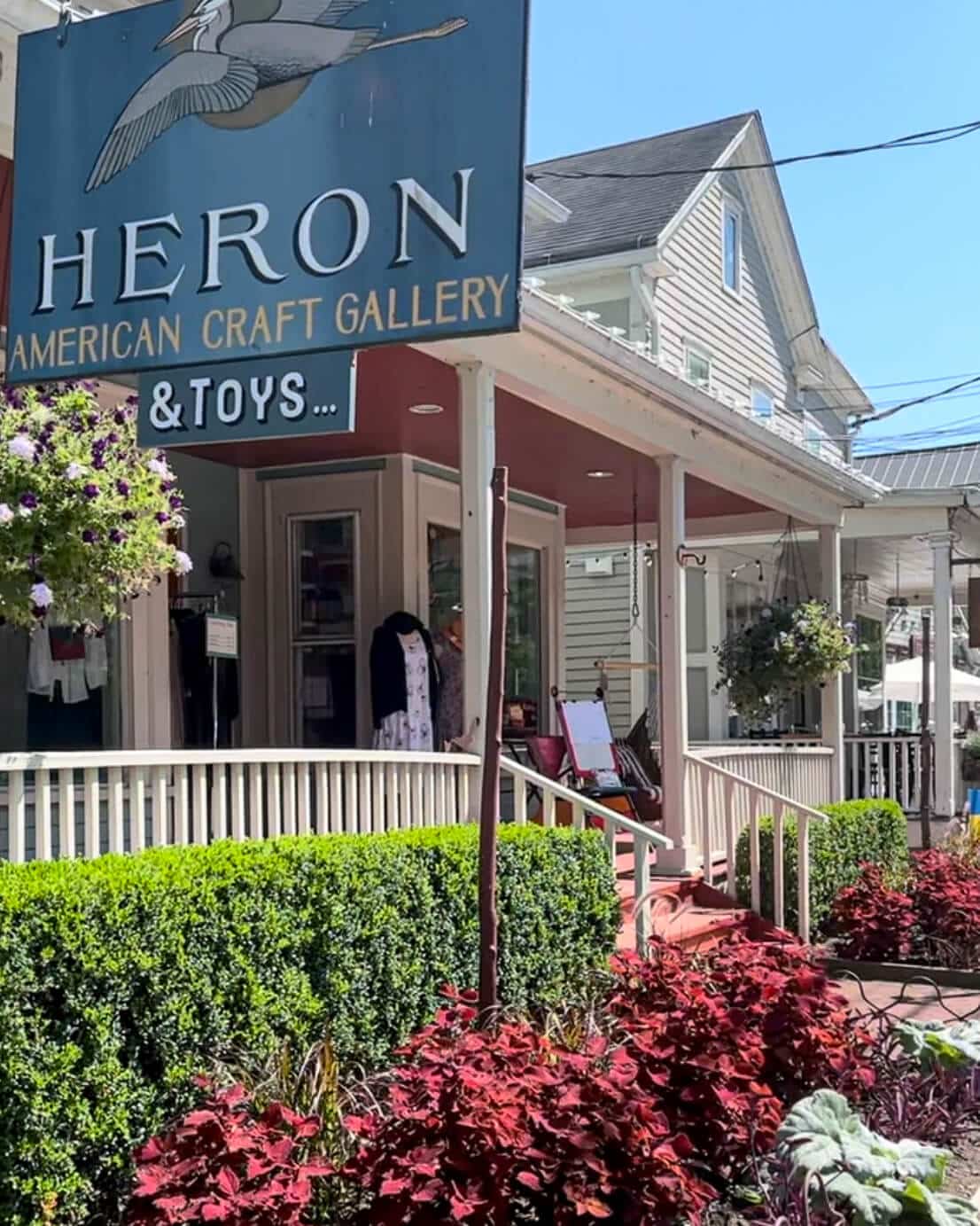 summer street view of Main Street with restaurant and gallery 