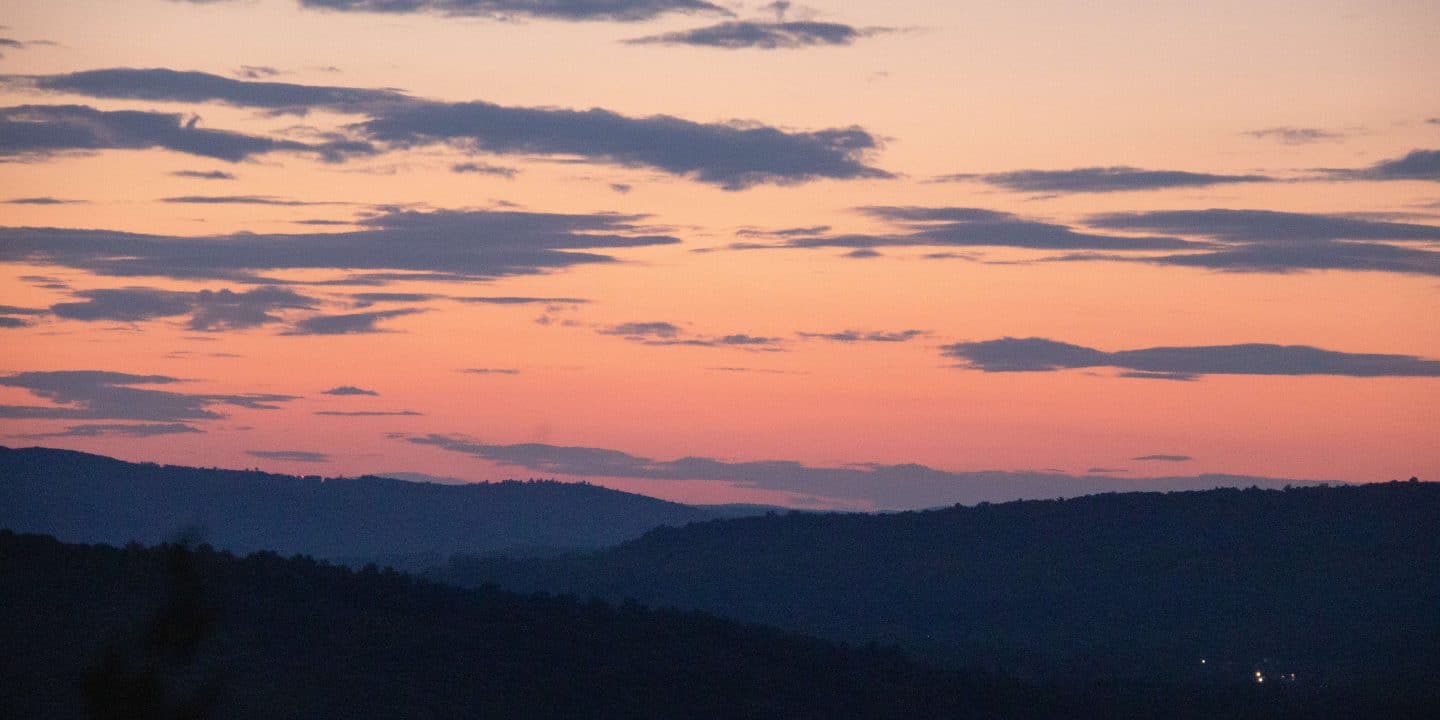 sunset mountain view with pink sky
