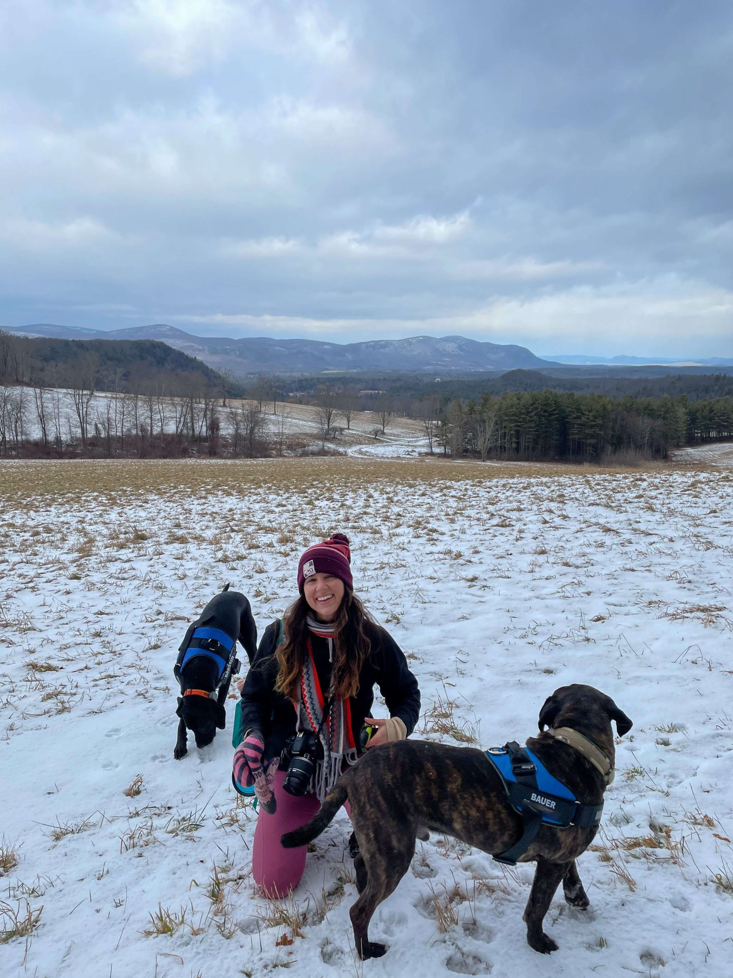 woman smiling in winter on a hike in connecticut on the Appalachian Trail