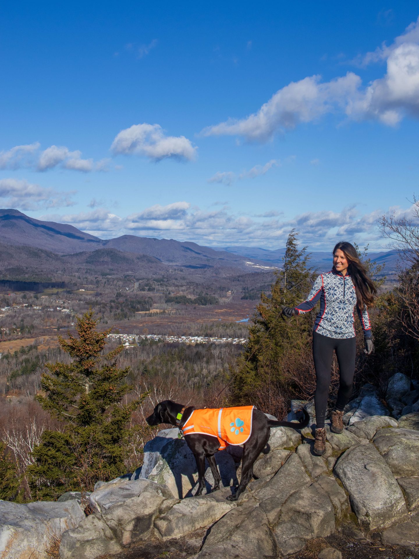 woman hiking with dog in the Berkshires