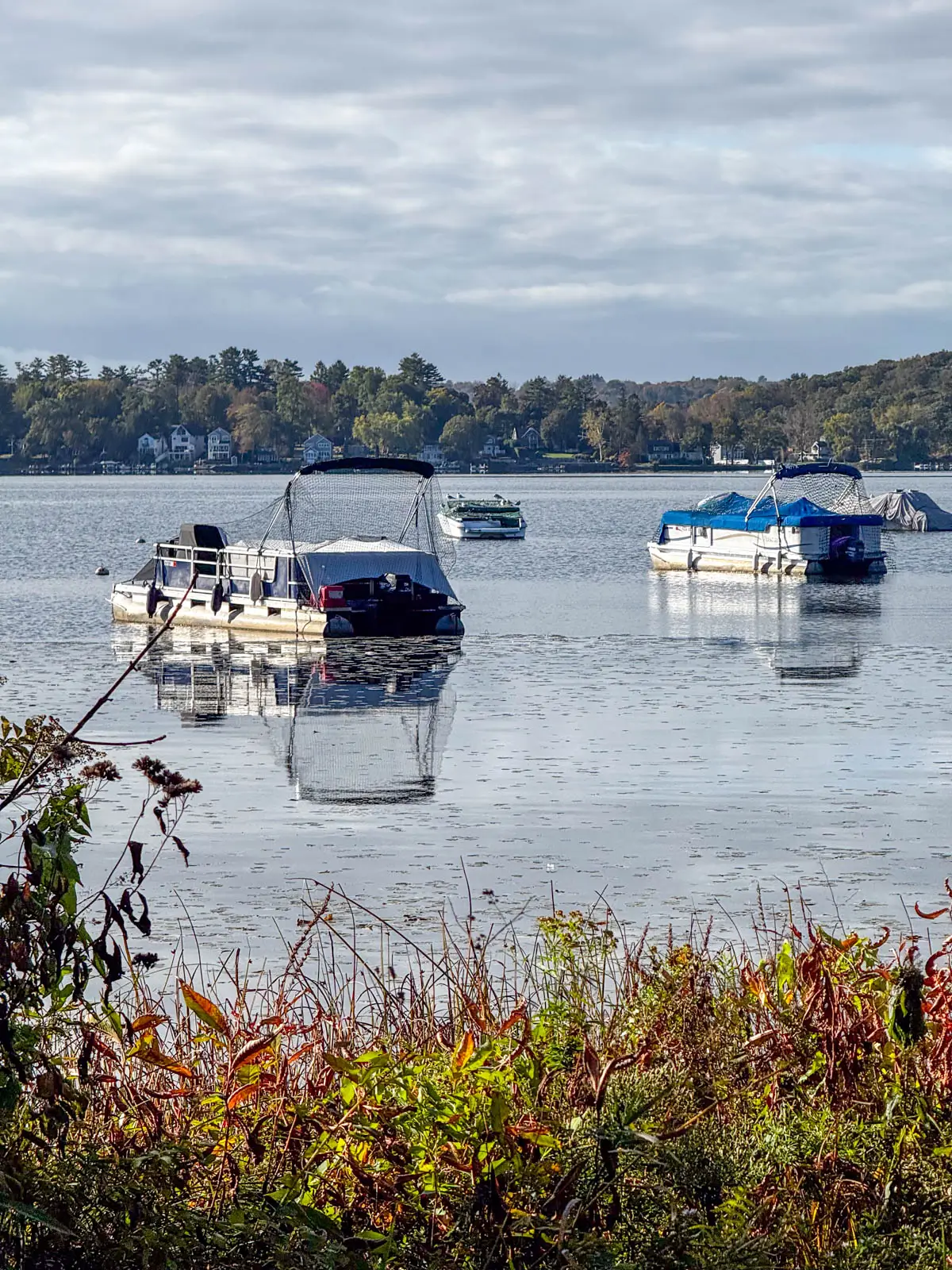 two white boats on bantam river in litchfield.
