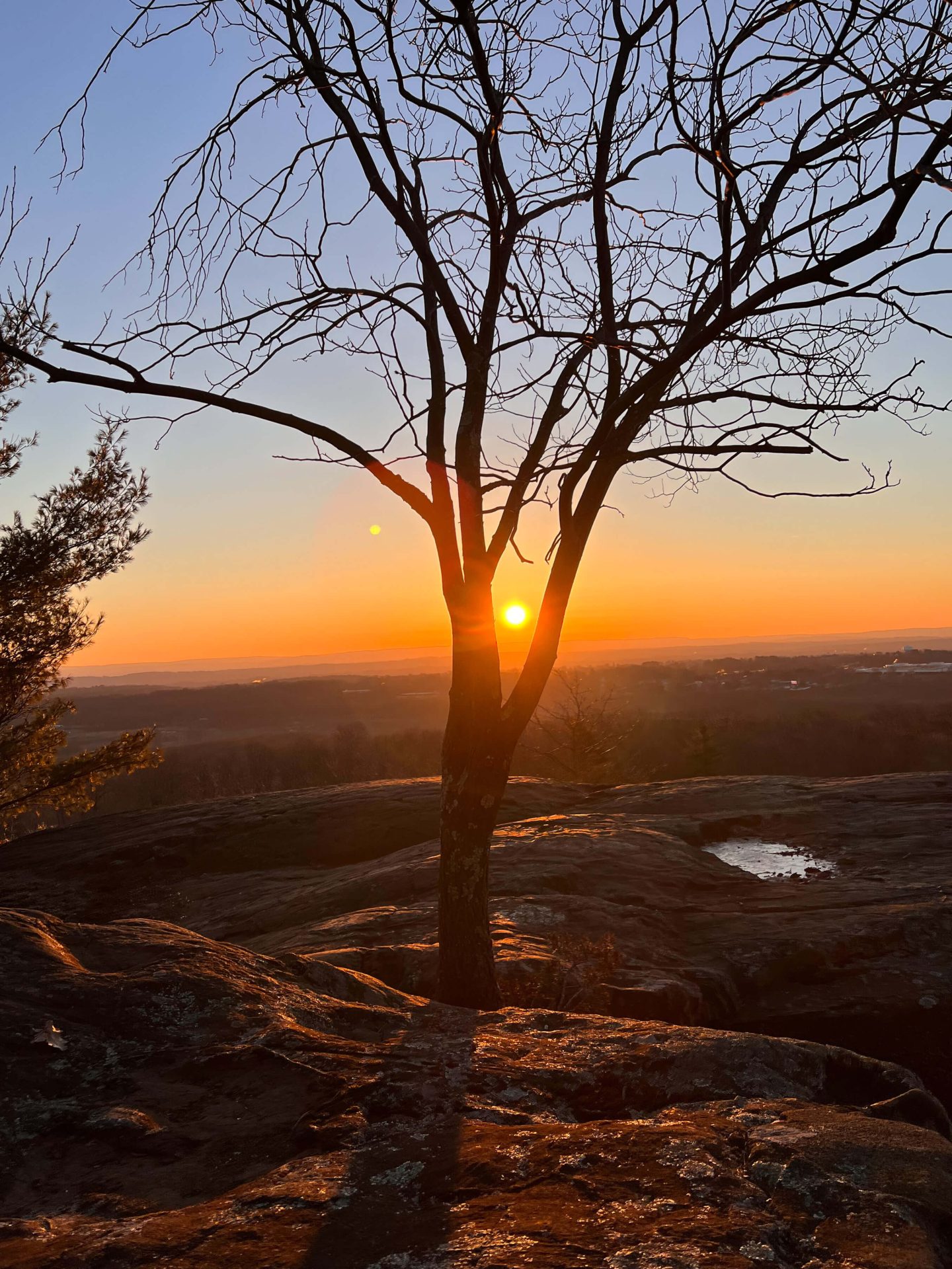 rattlesnake mountain at sunrise time with orange colors in sky