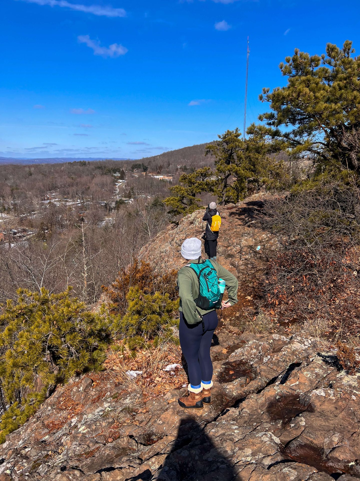 group of women hiking to rattlesnake mountain in farmington ct