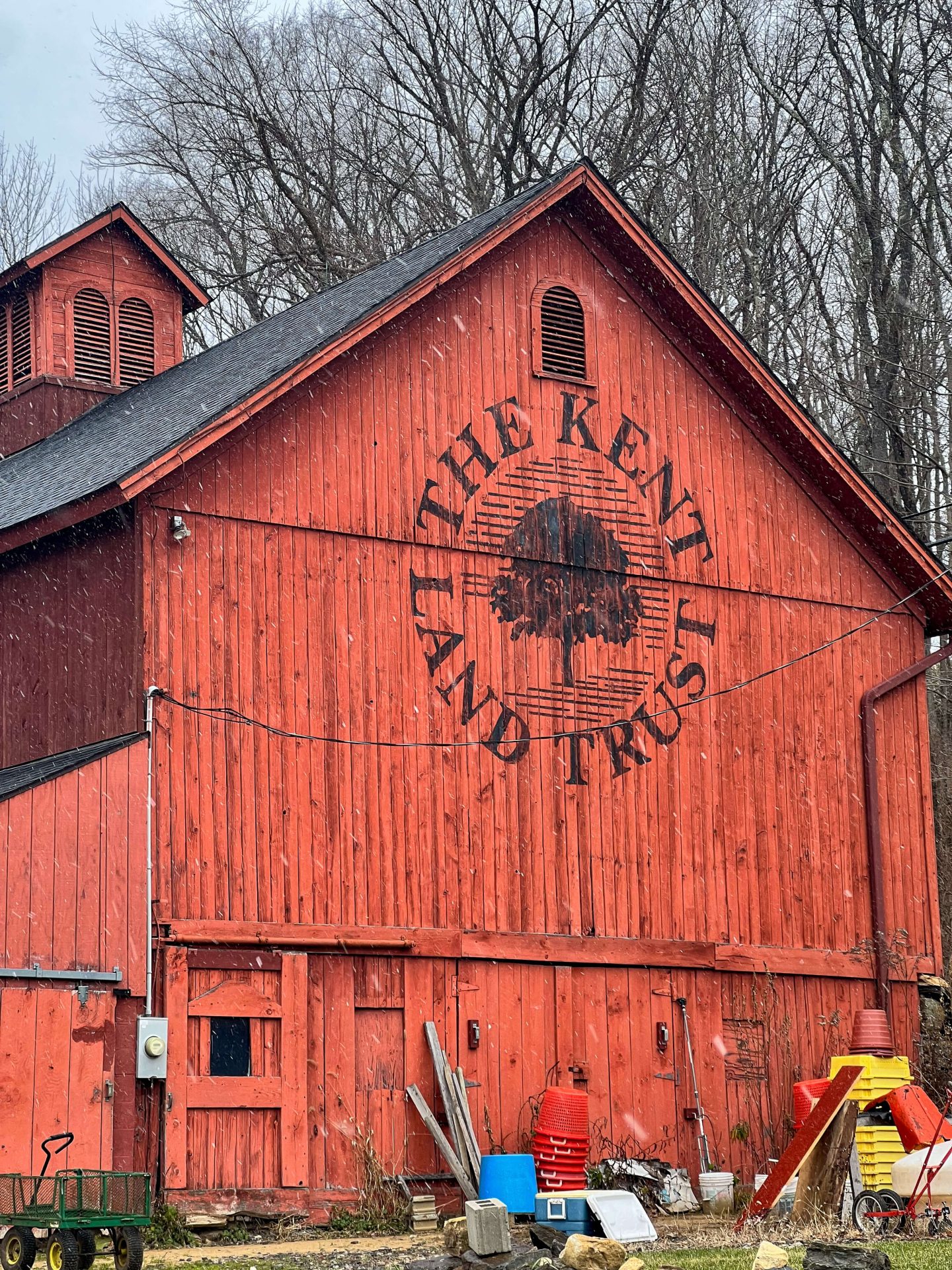 kent land trust in winter with red barn