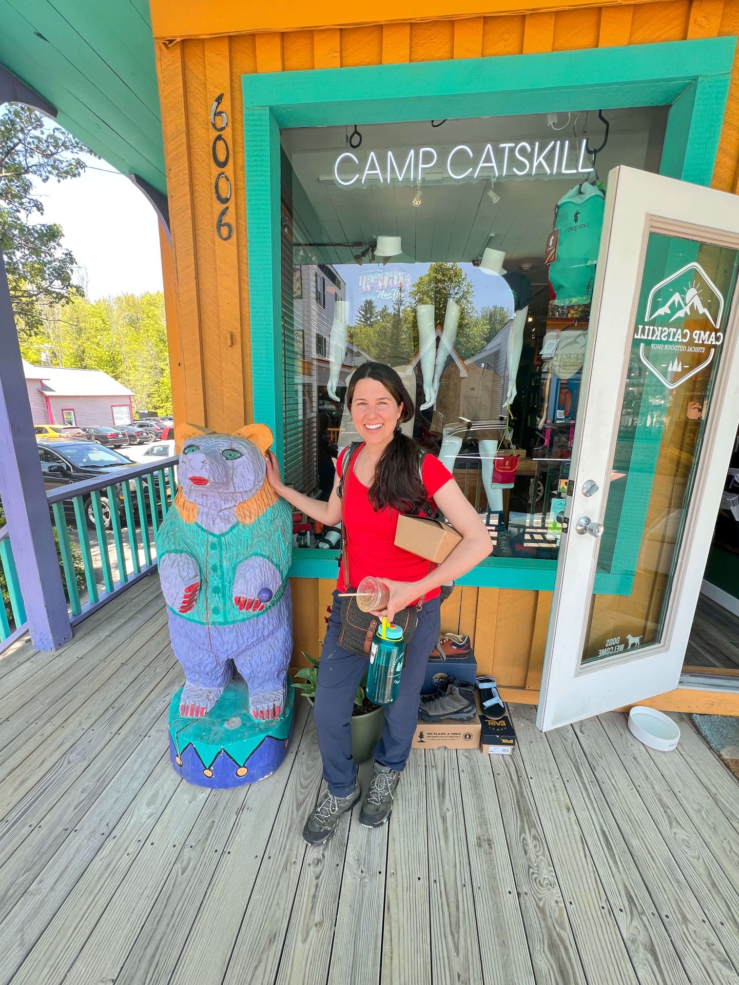 woman in red shirt at camp catskill store tannersville ny