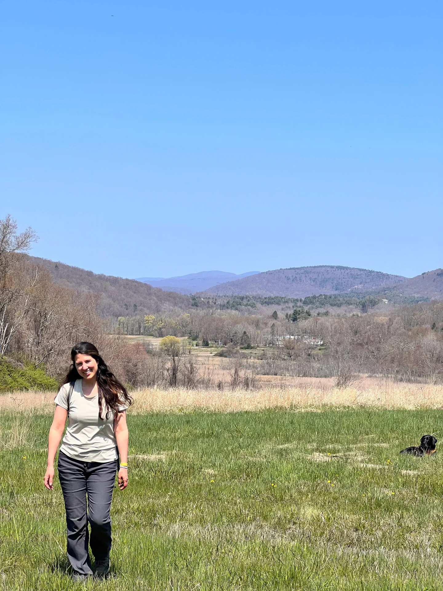 woman smiling at sharon land trust benton hill preserve
