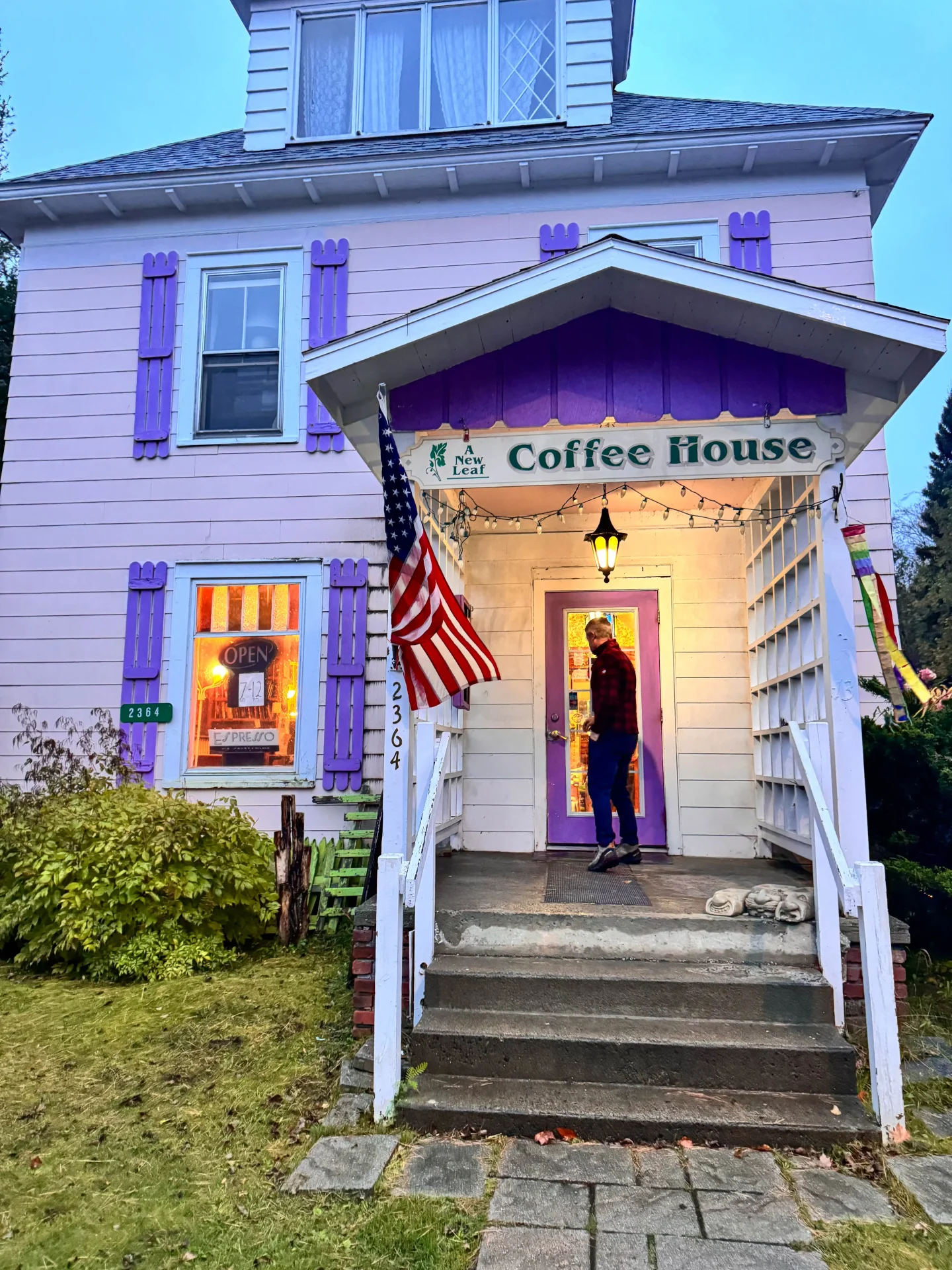 outside of a new leaf coffee shop in downtown lake placid