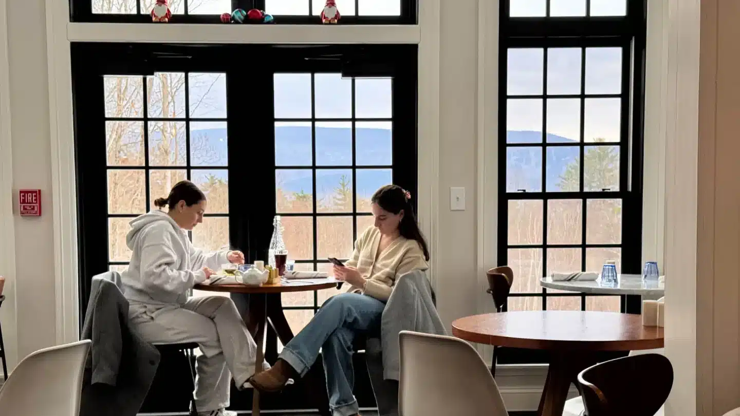 two women sitting at curate cafe at southern vermont arts center