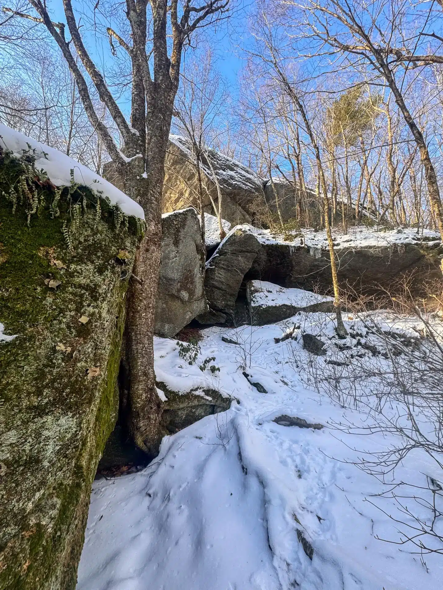 snowy winter hike at indian council caves in ct