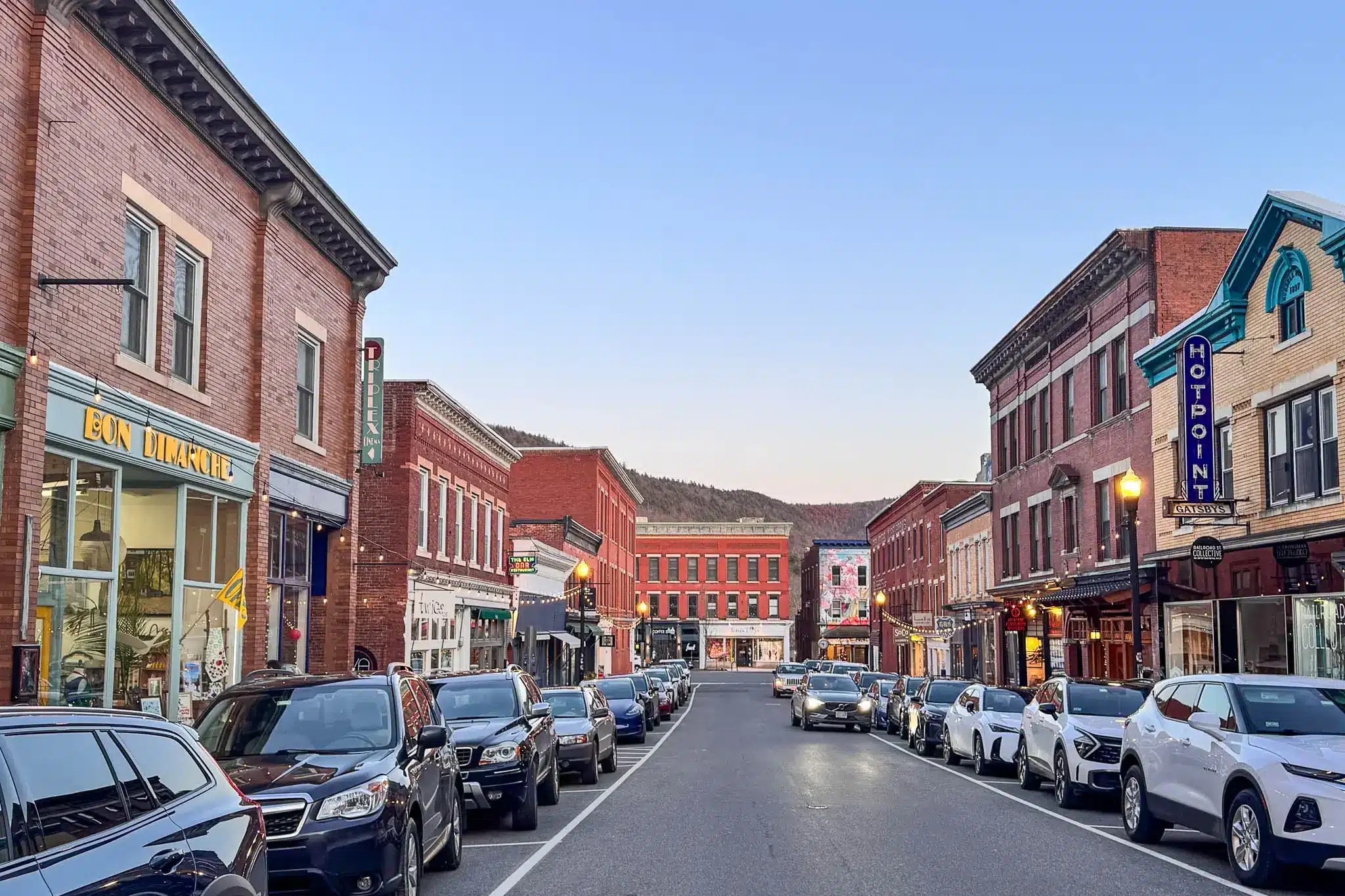 colorful buildings on railroad street in downtown great barrington at dusk