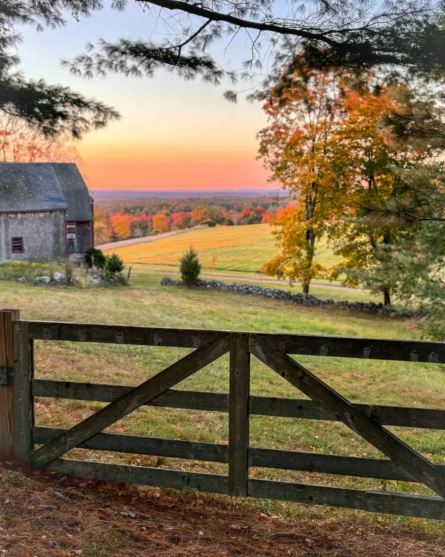 barn and farm view with fence at ward reservation at sunrise time in andover massachusetts