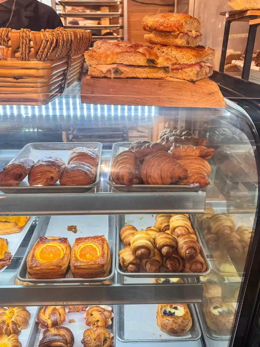 variety of pastries in a glass case at a bakery in cornwall ct