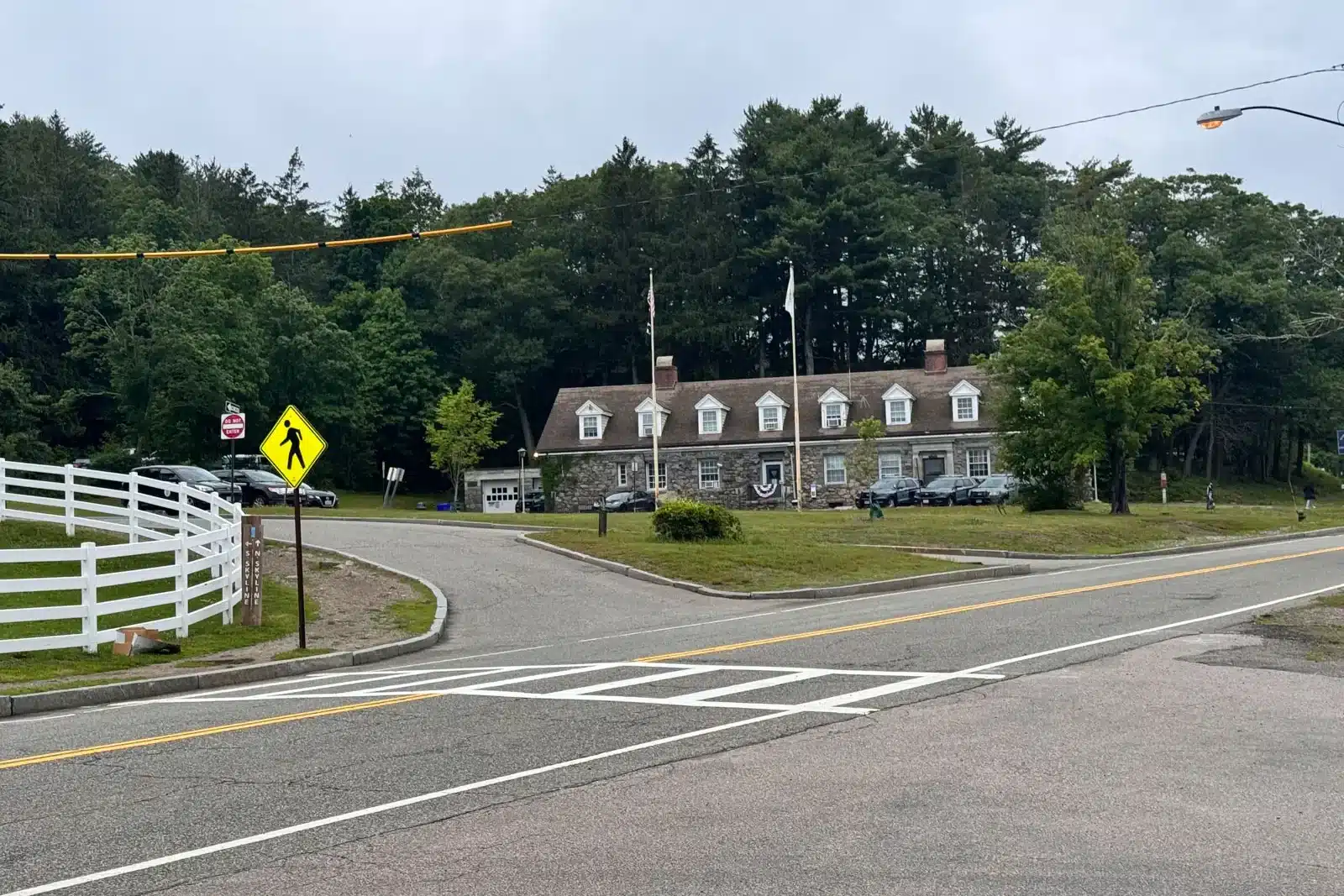 street leading to skyline trail with the Massachusetts State Police building in the distance.
