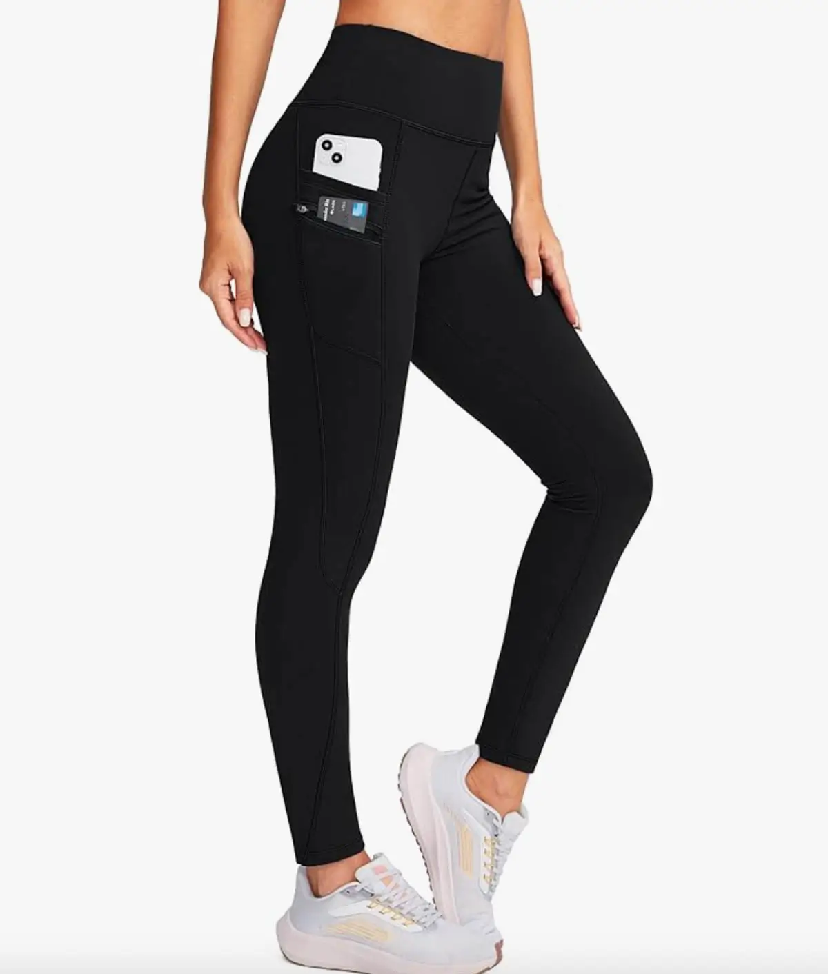 insulated winter hiking legging for women in black with side pocket for phone.
