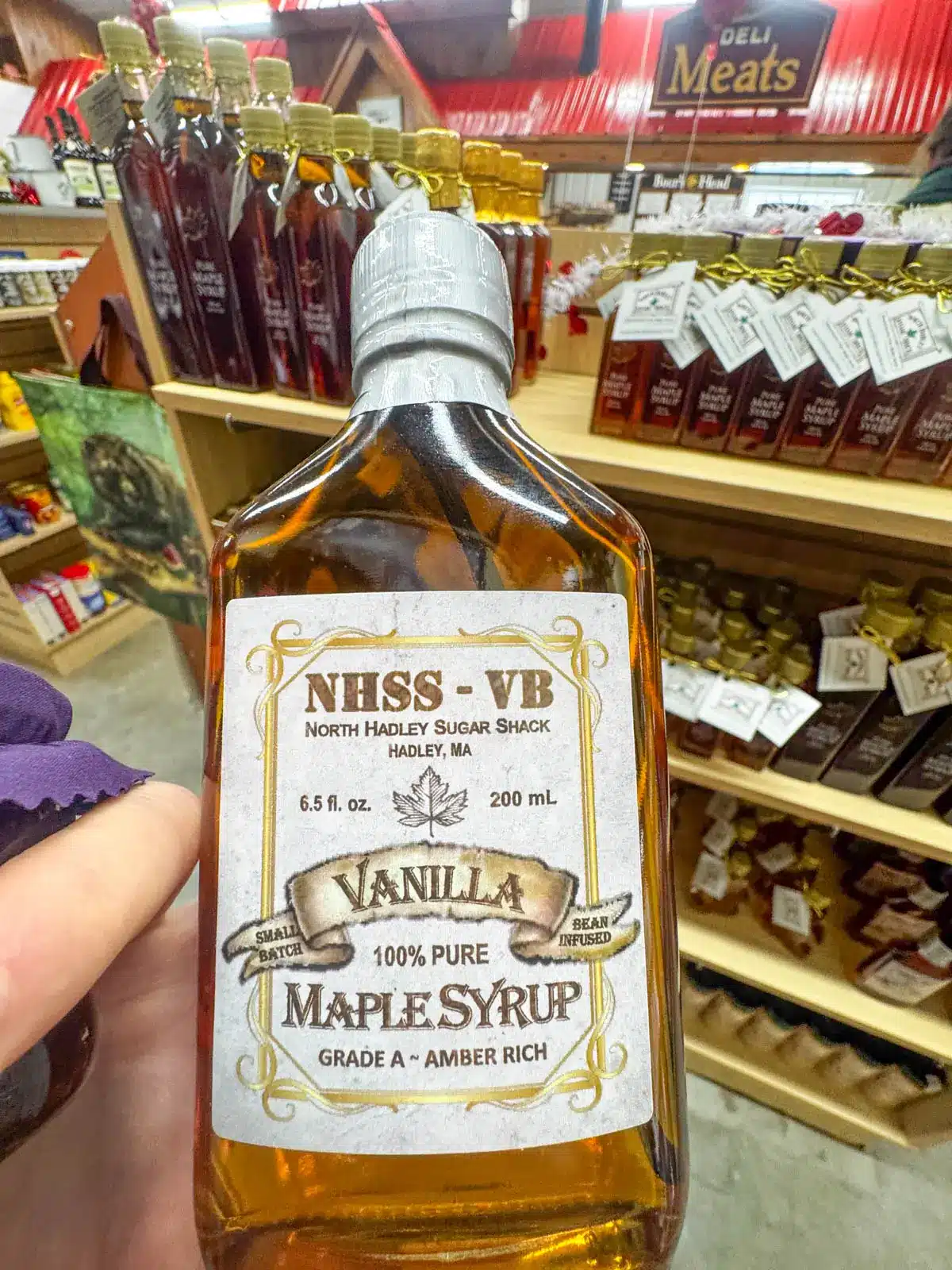 glass bottle of vanilla maple syrup.
