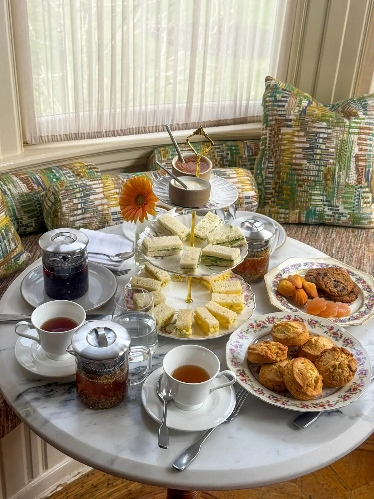 tea time with array of pastries, scones, and little sandwiches at belden house in litchfield.