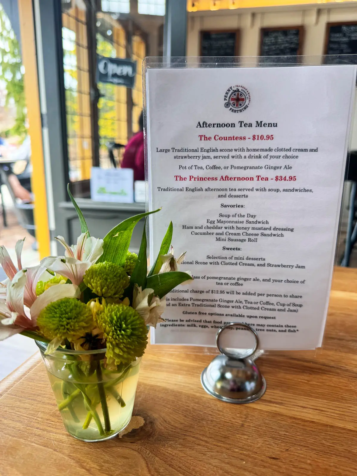 spring brunch menu on white paper on wooden table.
